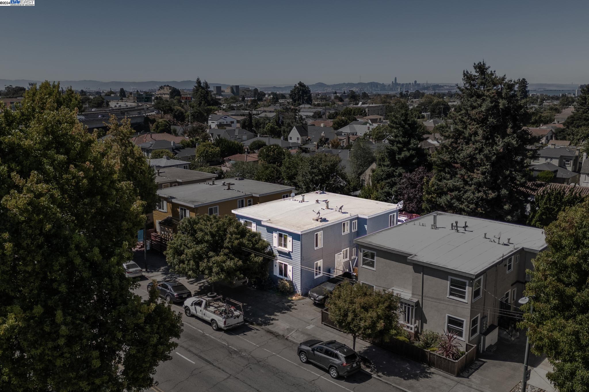 5659 Telegraph Avenue Oakland, CA 94609 - Photo 9 of 42 an aerial view of a house with yard swimming pool and outdoor seating