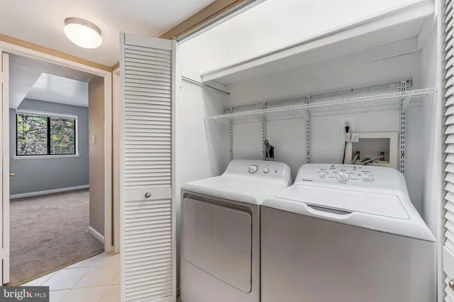 a room with a bed and a window