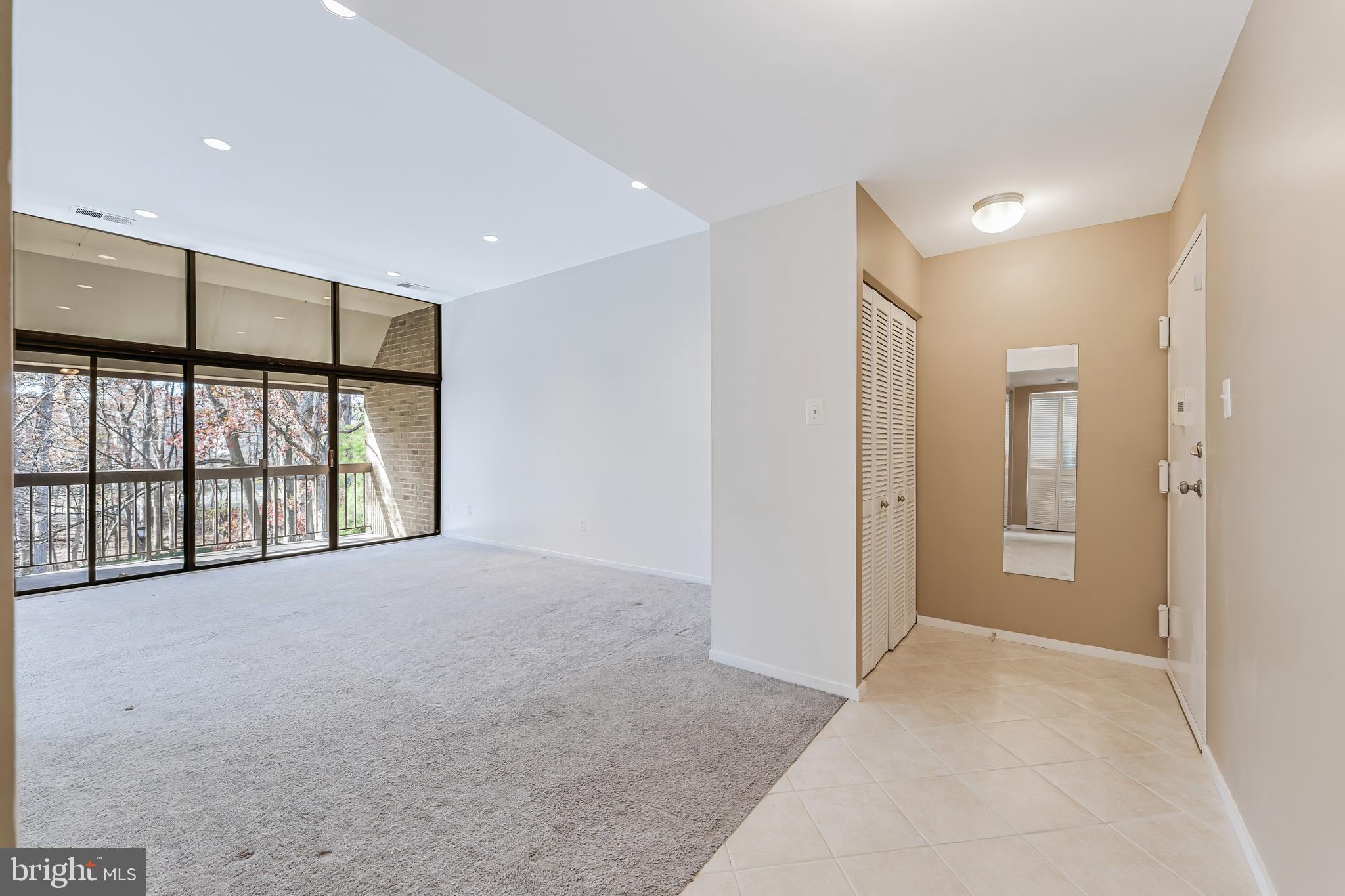 1623 Parkcrest Circle, Unit 9B/300 Reston, VA 20190 - Photo 5 of 32 a view of an empty room with a window