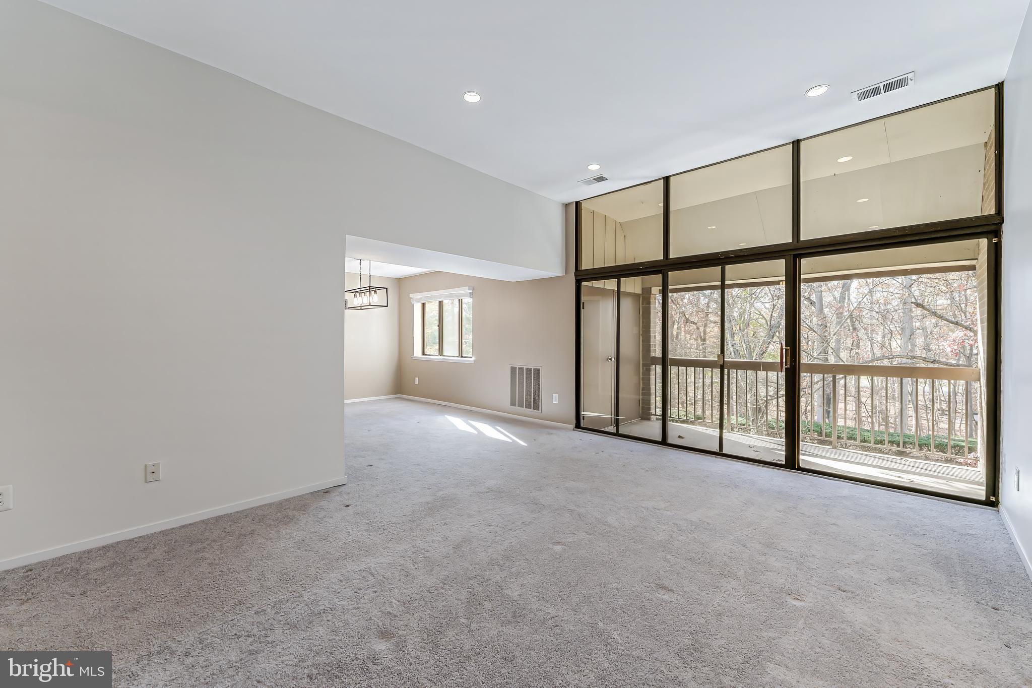 1623 Parkcrest Circle, Unit 9B/300 Reston, VA 20190 - Photo 6 of 32 a view of an empty room with a window