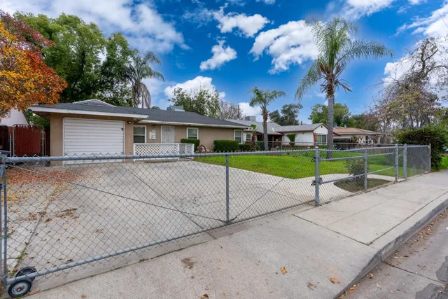 a house with yard in front of it
