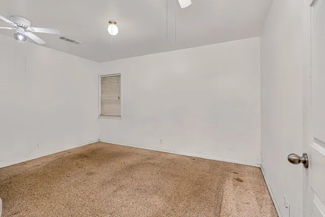 an empty room with white door