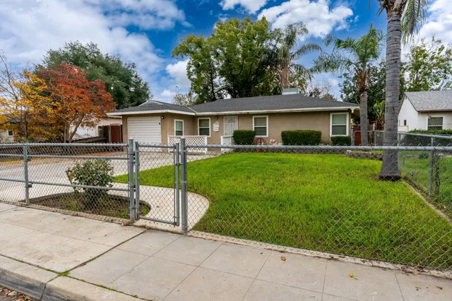 front view of a house with a patio