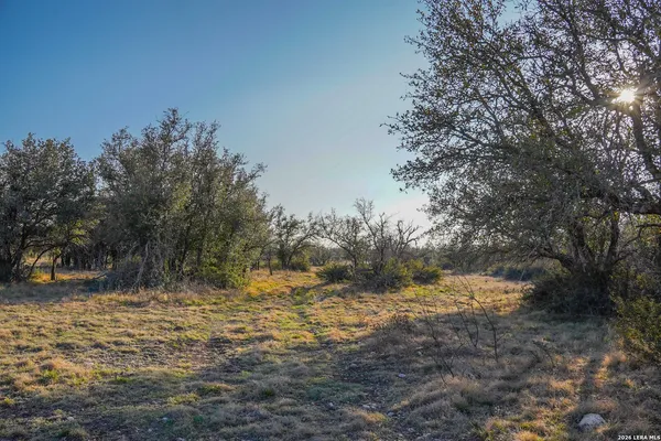 an aerial view of ocean with beach