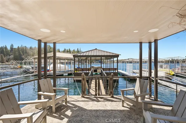 a view of a kitchen with dining table and chairs