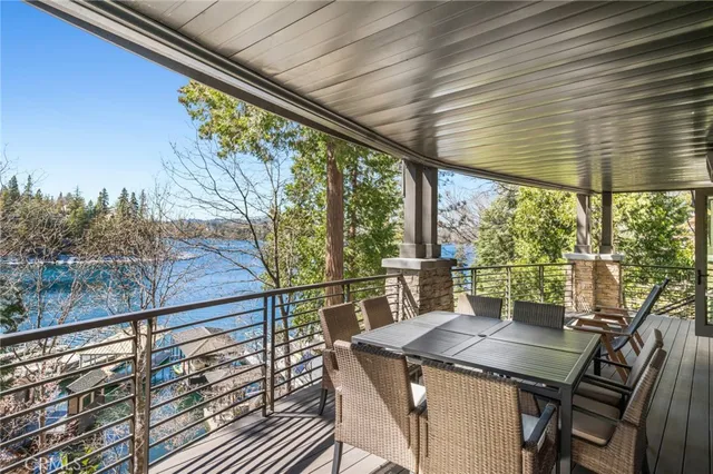 a view of balcony with furniture and wooden deck
