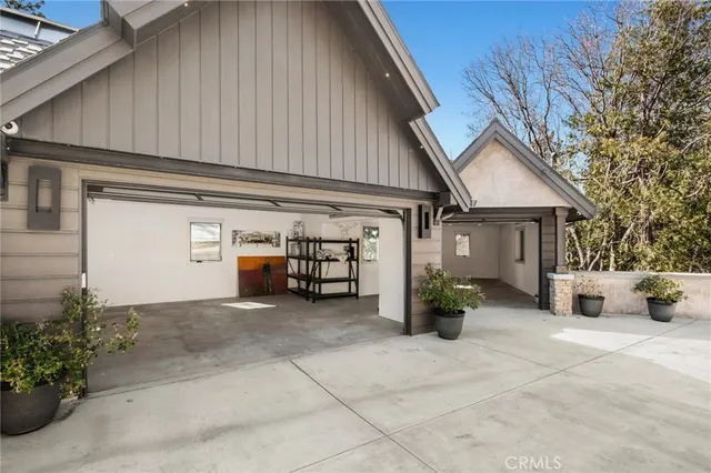 a front view of house with yard and outdoor seating