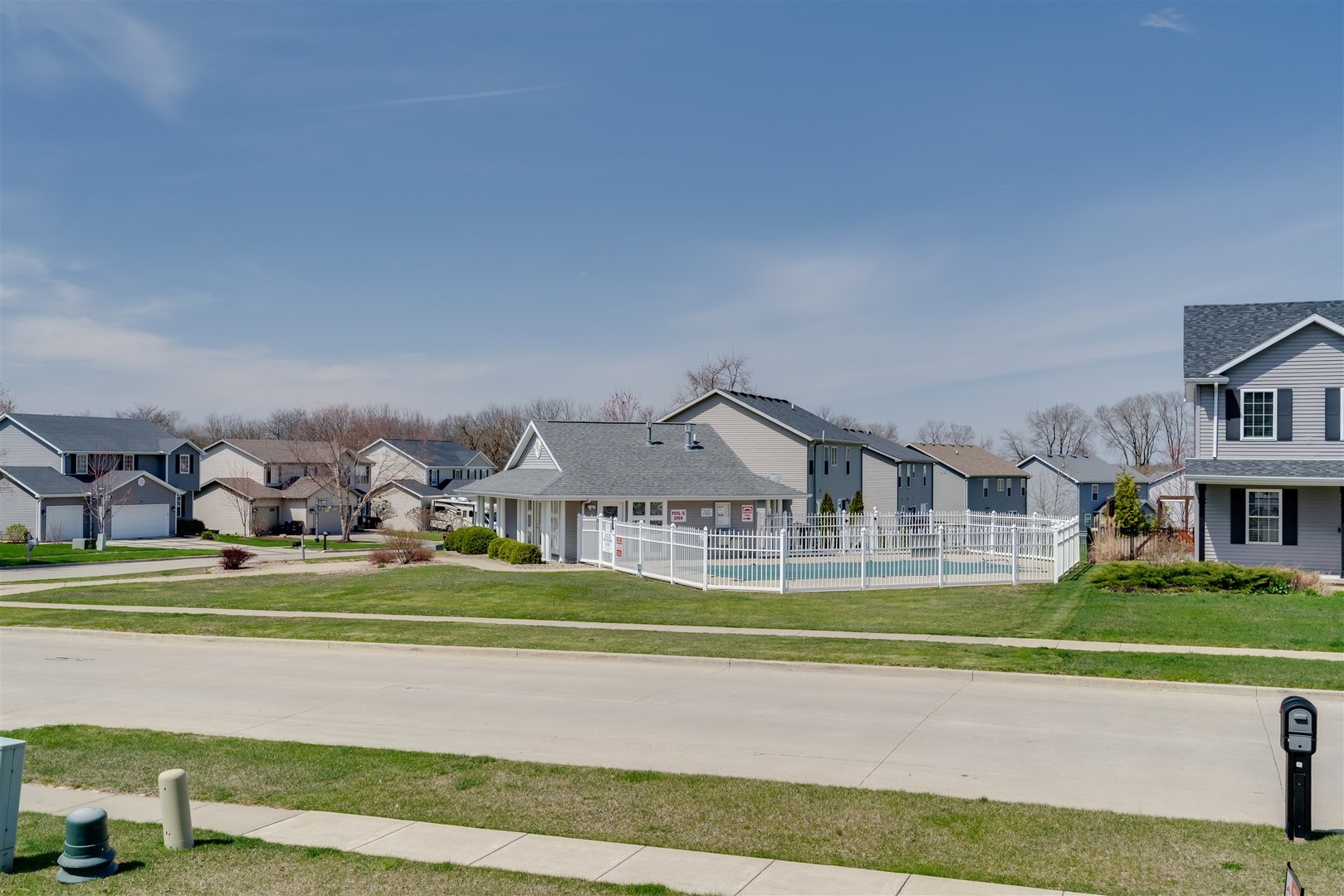 2514 Grey Fox Trail Bloomington, IL 61705 - Photo 32 of 37 a front view of a house with a garden and plants
