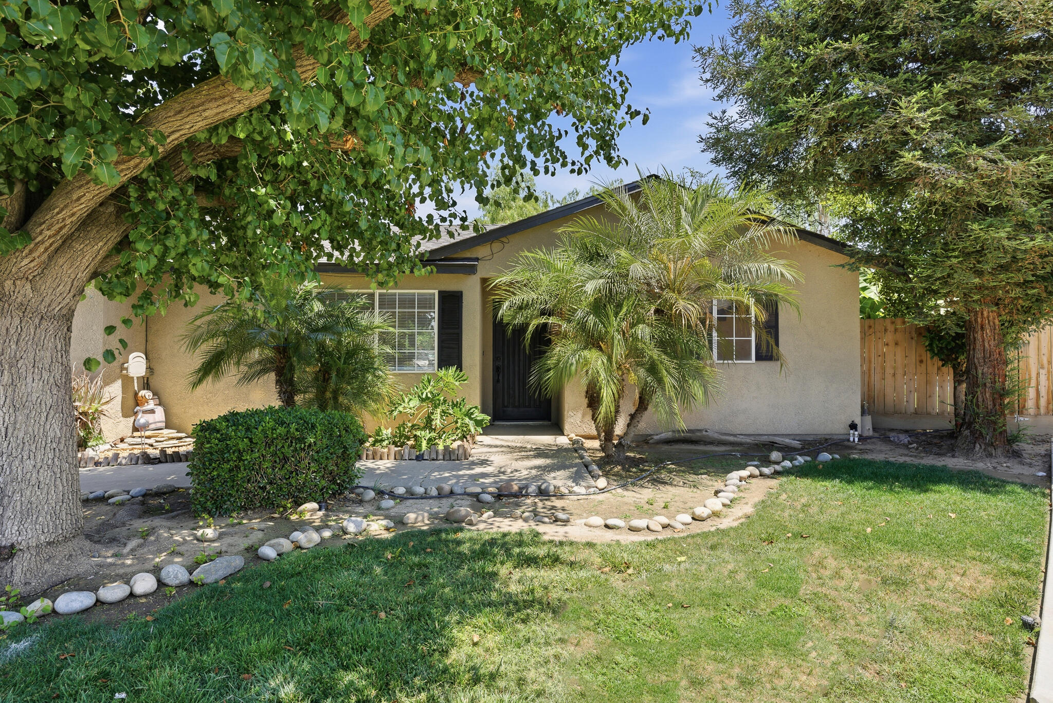 618 Birdsong Court Exeter, CA 93221 - Photo 3 of 62 a view of a house with a yard