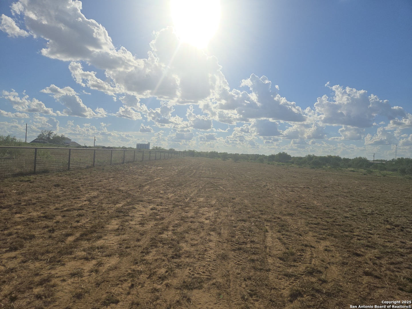 15215 Cassiano Road Elmendorf, TX 78112 - Photo 4 of 7 a view of lake and mountain