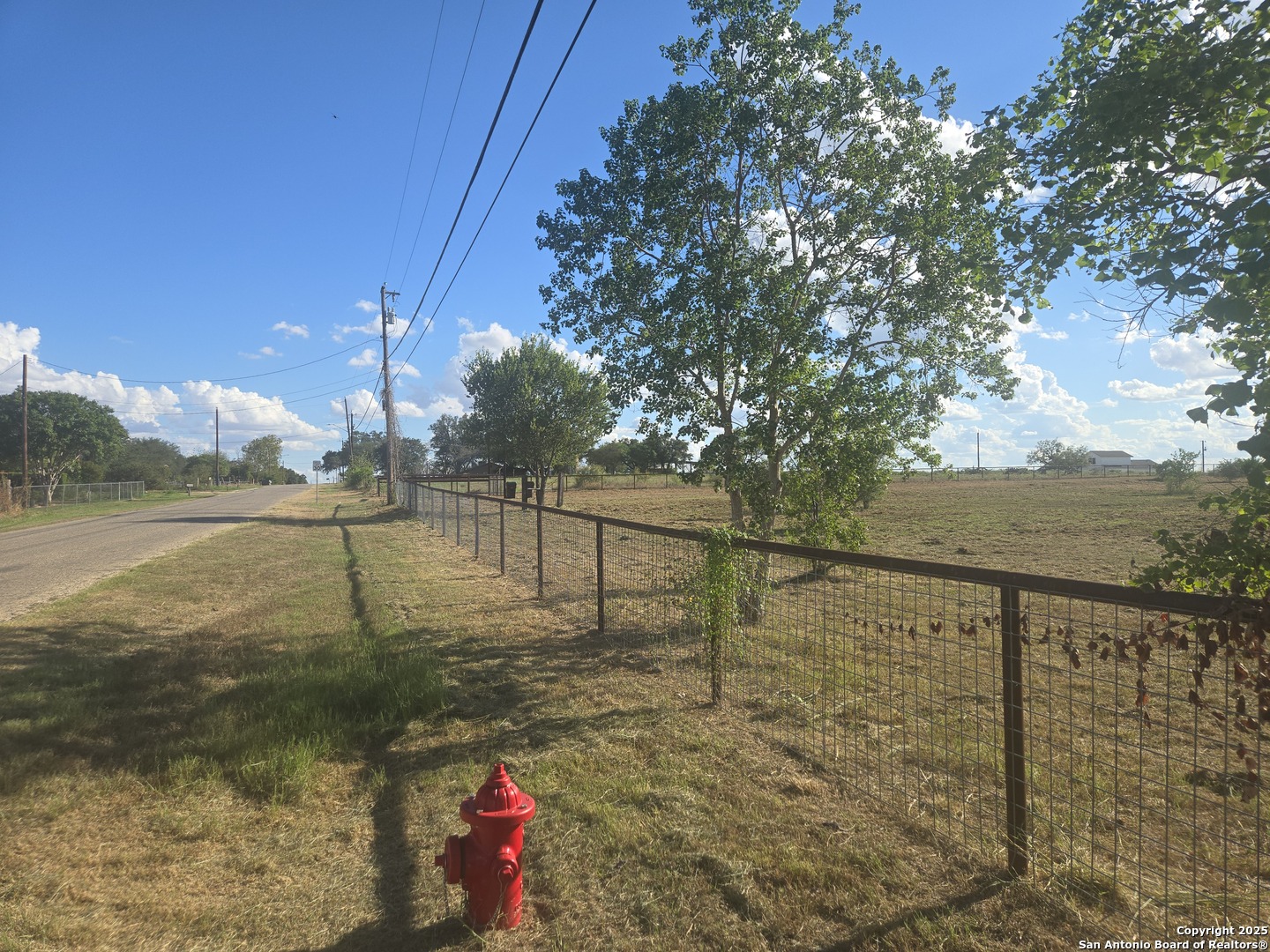 15215 Cassiano Road Elmendorf, TX 78112 - Photo 7 of 7 a view of a water pond