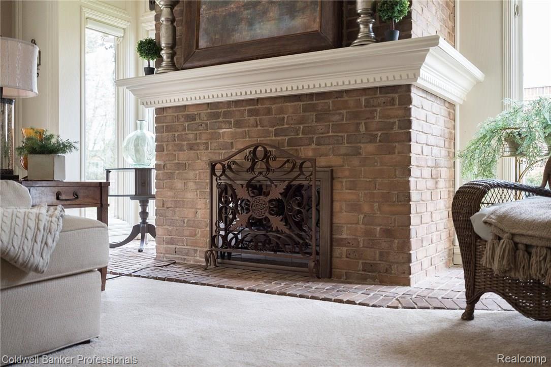 3724 Newcastle Drive Rochester, MI 48306 - Photo 13 of 39 Super cool gas fireplace is perfect for our long Michigan winters!