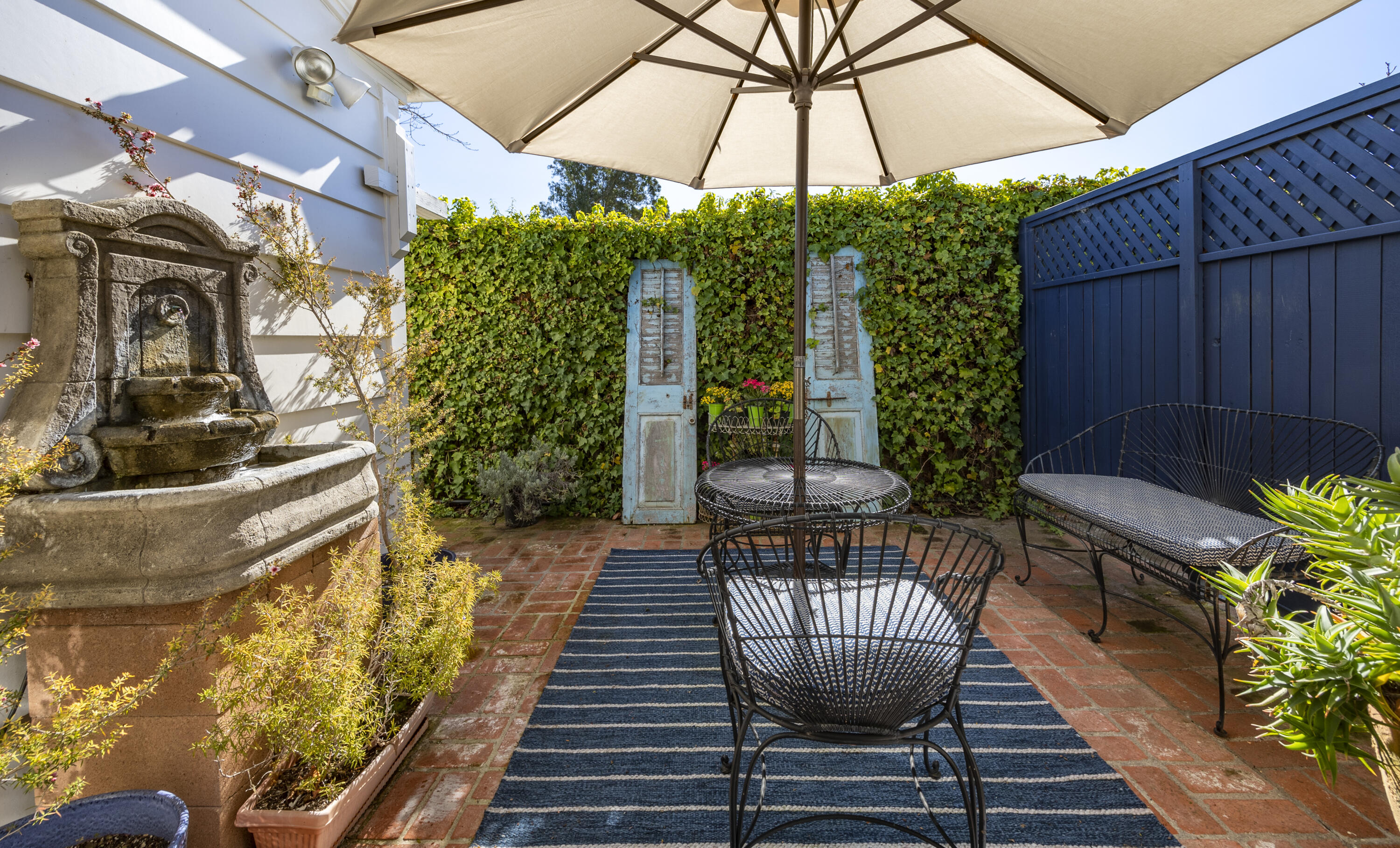 544 San Ysidro Road, Unit B Montecito, CA 93108 - Photo 11 of 18 a view of a porch with furniture and backyard