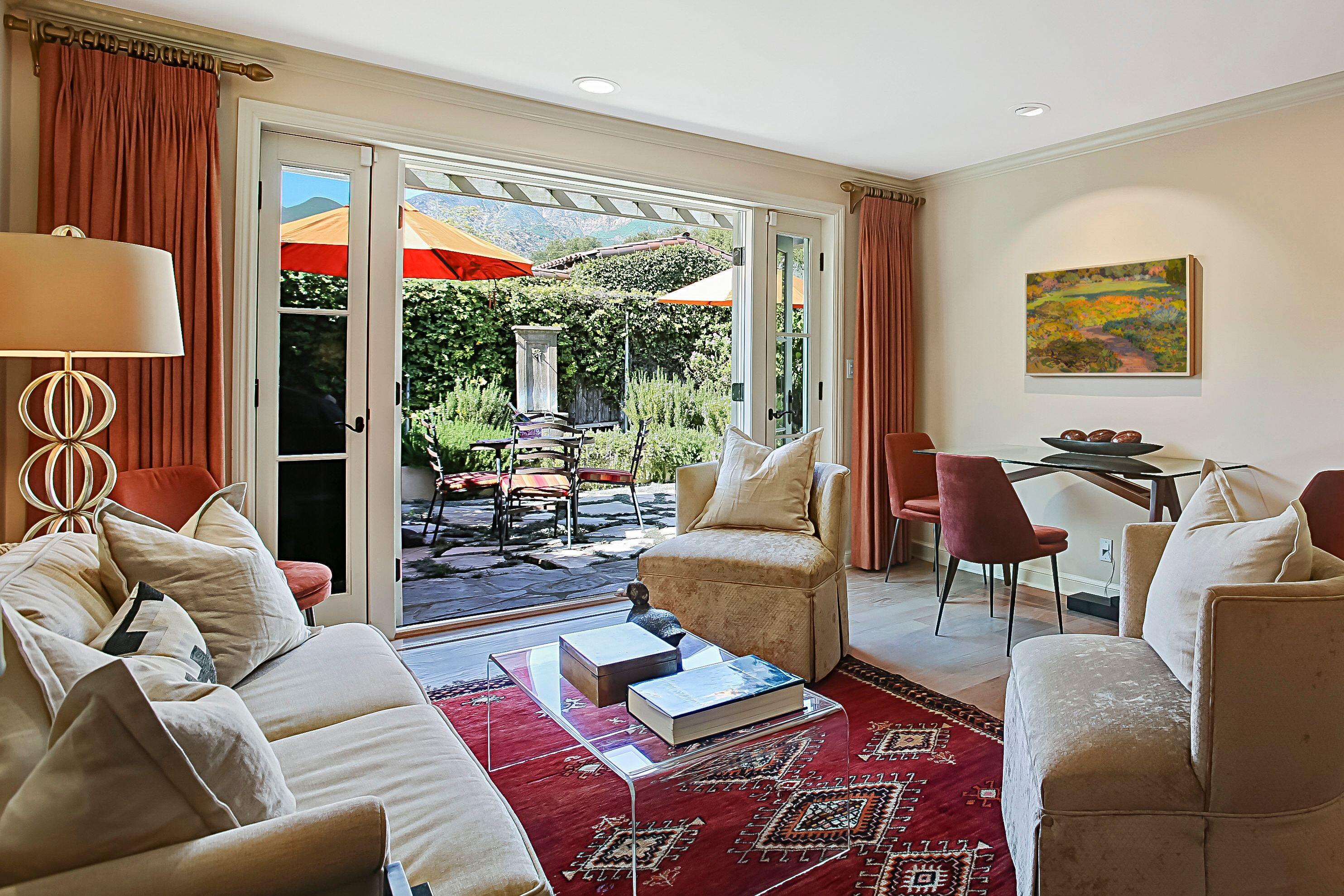 544 San Ysidro Road, Unit B Montecito, CA 93108 - Photo 6 of 18 a living room with furniture and a large window