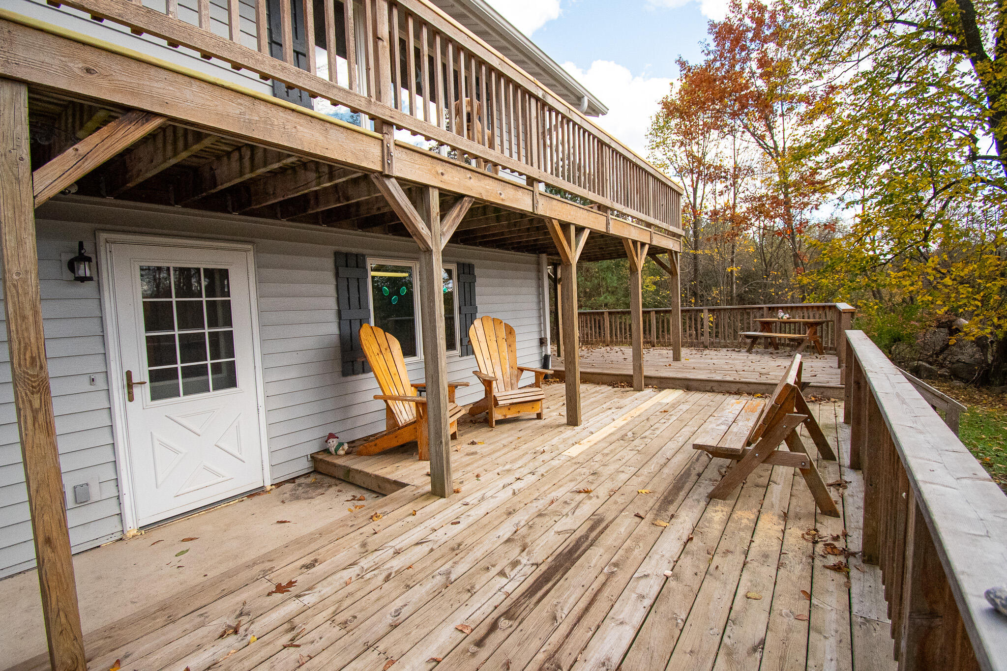 E516 Rustad Road Harrison, WI 54945 - Photo 14 of 52 Front lower deck
