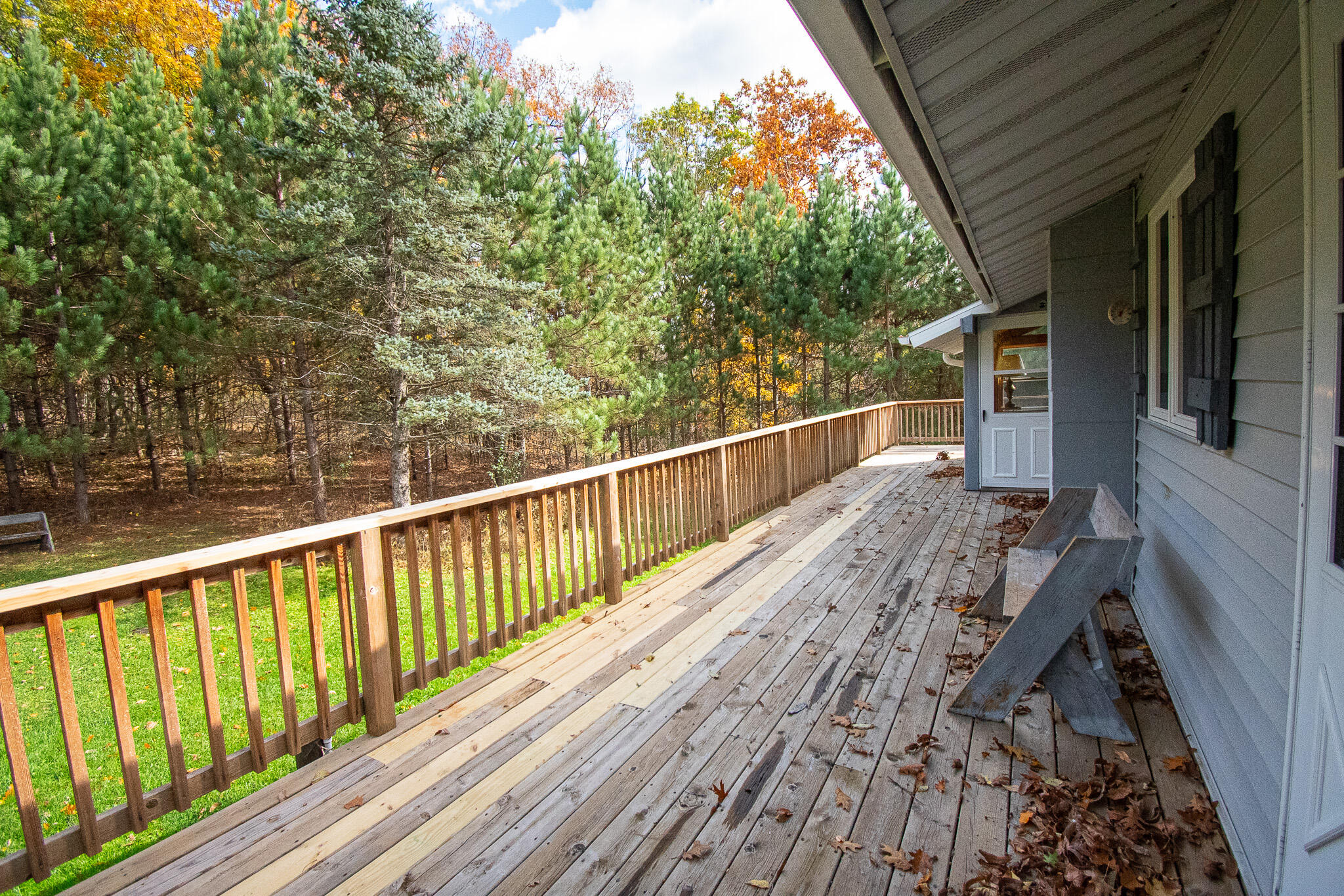 E516 Rustad Road Harrison, WI 54945 - Photo 41 of 52 Back deck off laundry and 3 season room