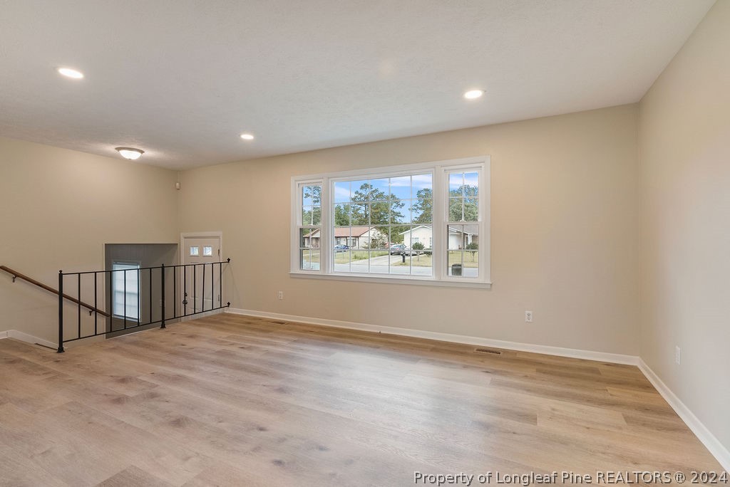 6623 Grist Mill Road Fayetteville, NC 28314 - Photo 3 of 15 a view of an empty room with a window