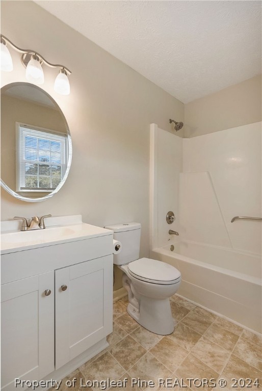 6623 Grist Mill Road Fayetteville, NC 28314 - Photo 10 of 15 a bathroom with a toilet a sink and a mirror