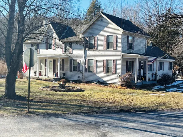 a front view of a house with swimming pool