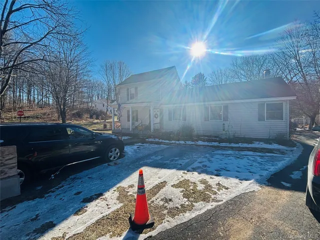 a view of a backyard of the house