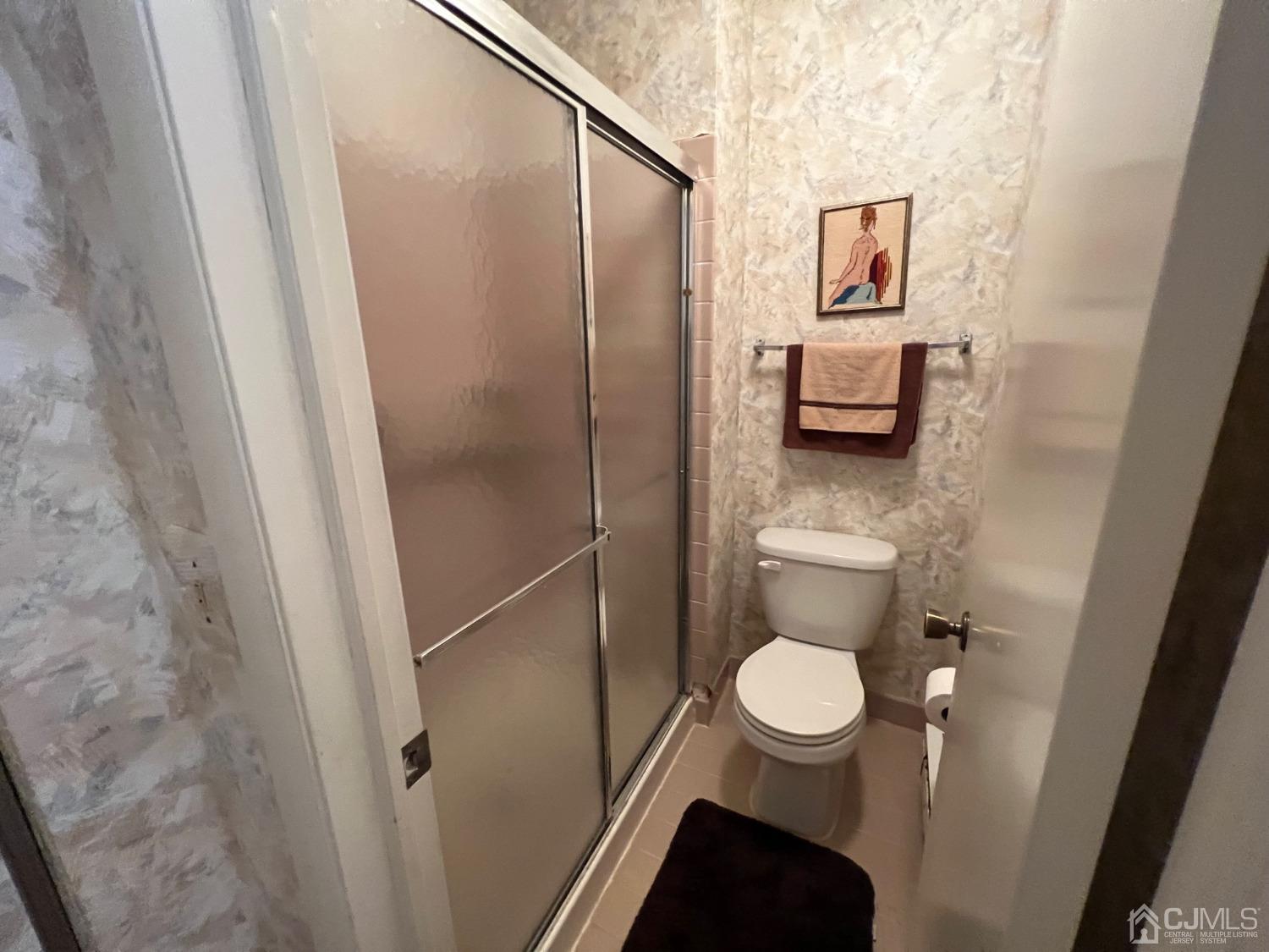 783B Risley Road, Unit A Monroe Township, NJ 08831 - Photo 25 of 30 a bathroom with a toilet and a shower