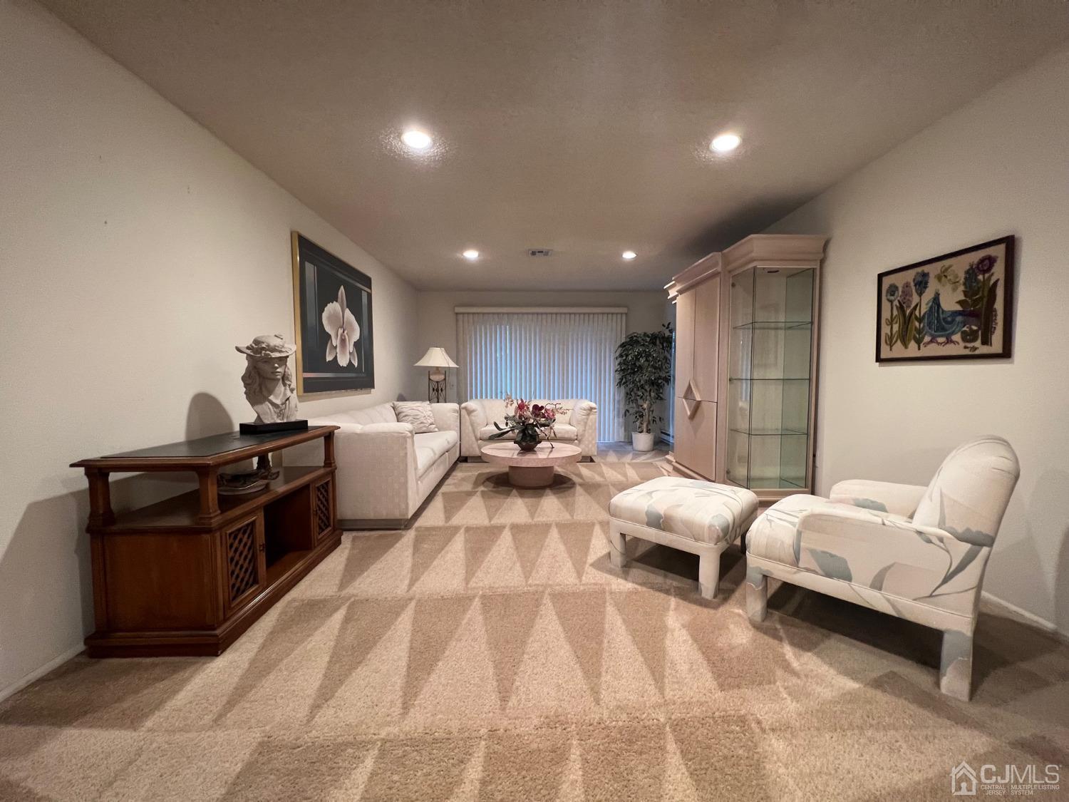 783B Risley Road, Unit A Monroe Township, NJ 08831 - Photo 6 of 30 a living room with furniture and a couch