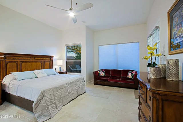 a view of a couches in the patio with a fire pit