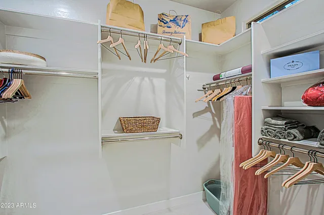 a backyard of a house with lots of green space and plants