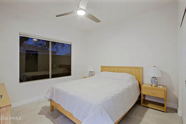 a view of yard from terrace with seating space