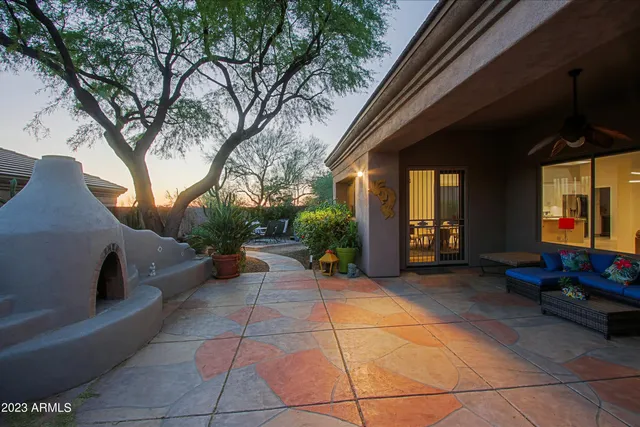 a view of a house with outdoor space and lake view