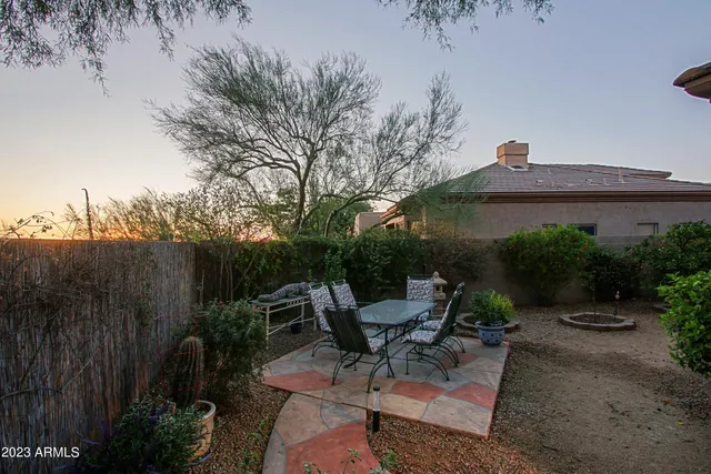 a view of a sitting area with fire pit