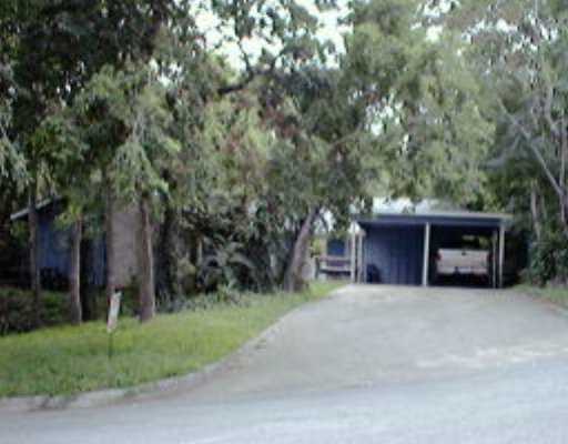 a house with trees in front of it