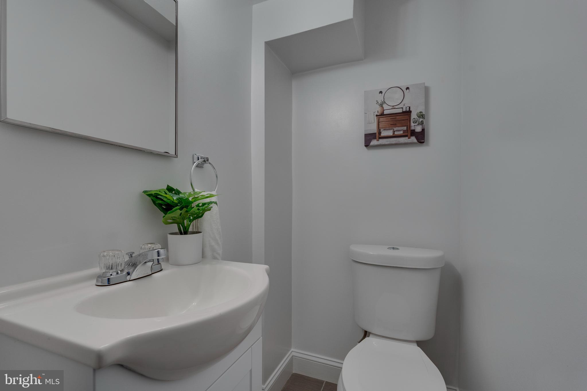 7753 Burnside Road Hyattsville, MD 20785 - Photo 17 of 38 Lower-Level Powder Room