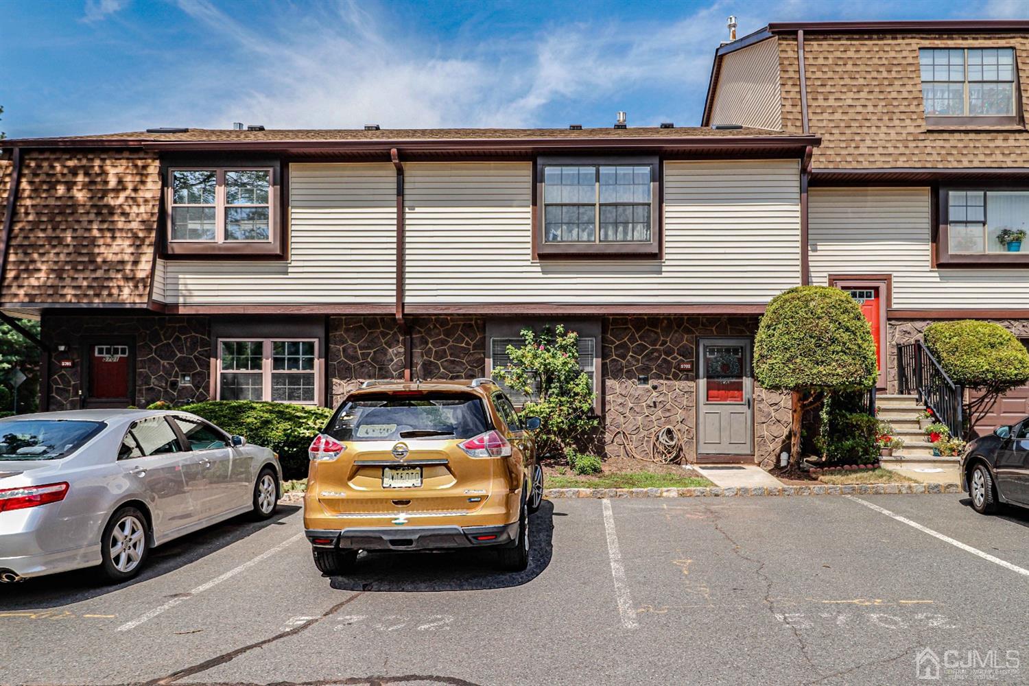 5702 Hana Road Edison, NJ 08817 - Photo 4 of 30 a car parked in front of a house