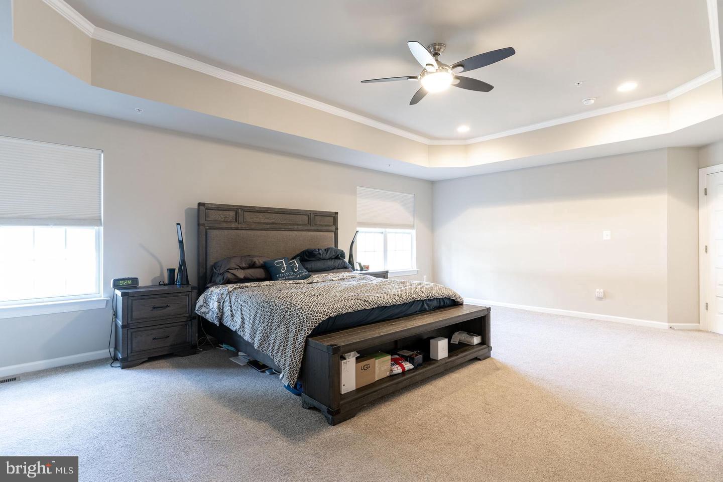6100 Oglethorpe Mill Drive Brandywine, MD 20613 - Photo 13 of 22 a bed sitting in a bedroom next to a window