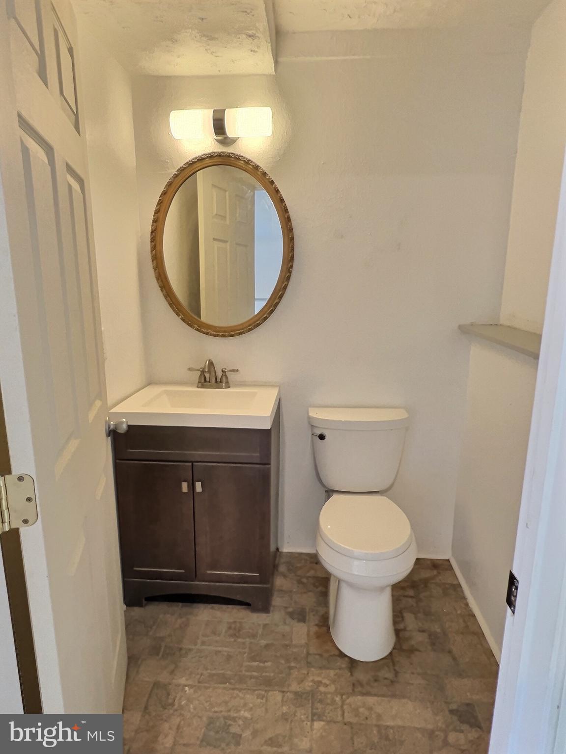 6106 Clinton Way Clinton, MD 20735 - Photo 28 of 35 Half bathroom