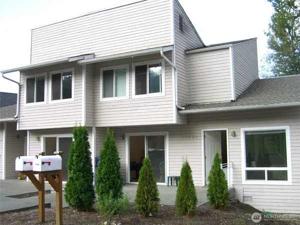 a front view of a house with patio