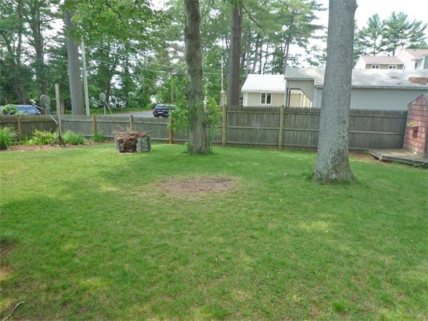 10 Sunset Road Norton, MA 02766 - Photo 23 of 23 a front view of a house with a yard