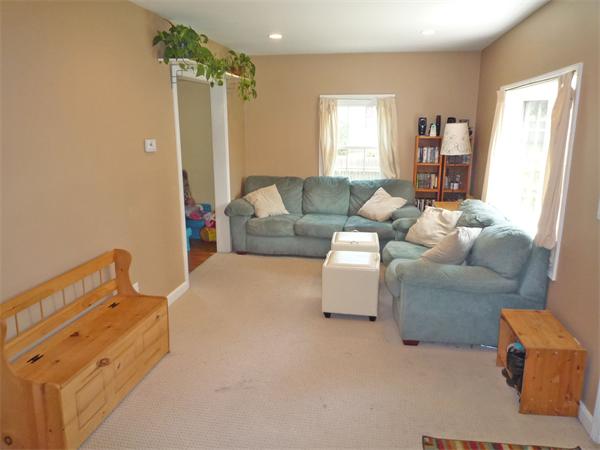 10 Sunset Road Norton, MA 02766 - Photo 9 of 23 a living room with furniture and a large window