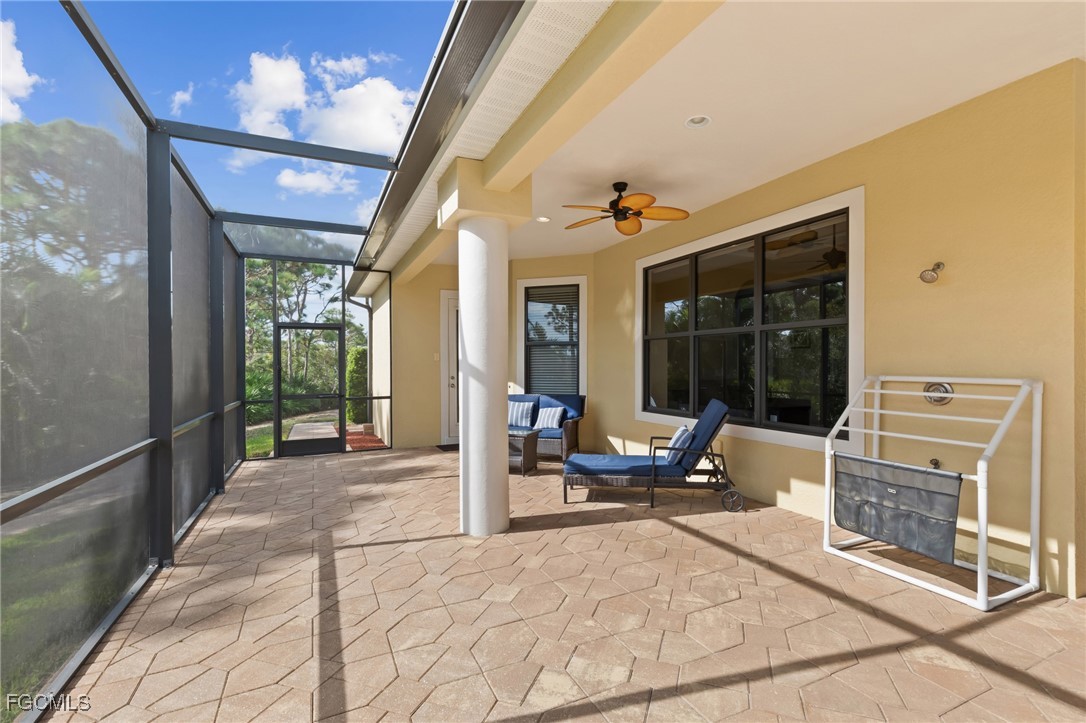 6057 Calusa Rdg Trail Bokeelia, FL 33922 - Photo 27 of 45 a view of a porch with furniture