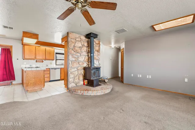 a bathroom with a shower and toilet