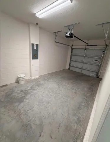 a view of a kitchen with wooden floor and a sink