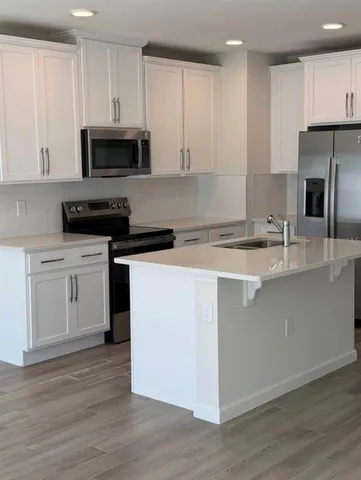 a house view with a backyard space