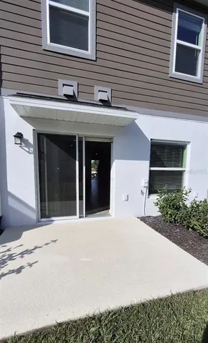 a front view of a house with garage