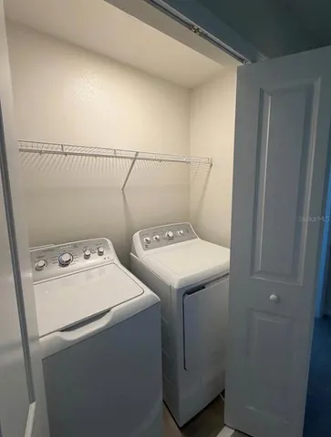 a kitchen with a sink and a window