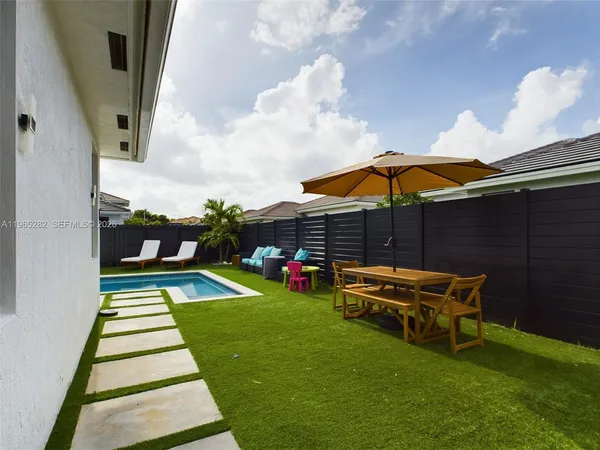 deck with table and chairs