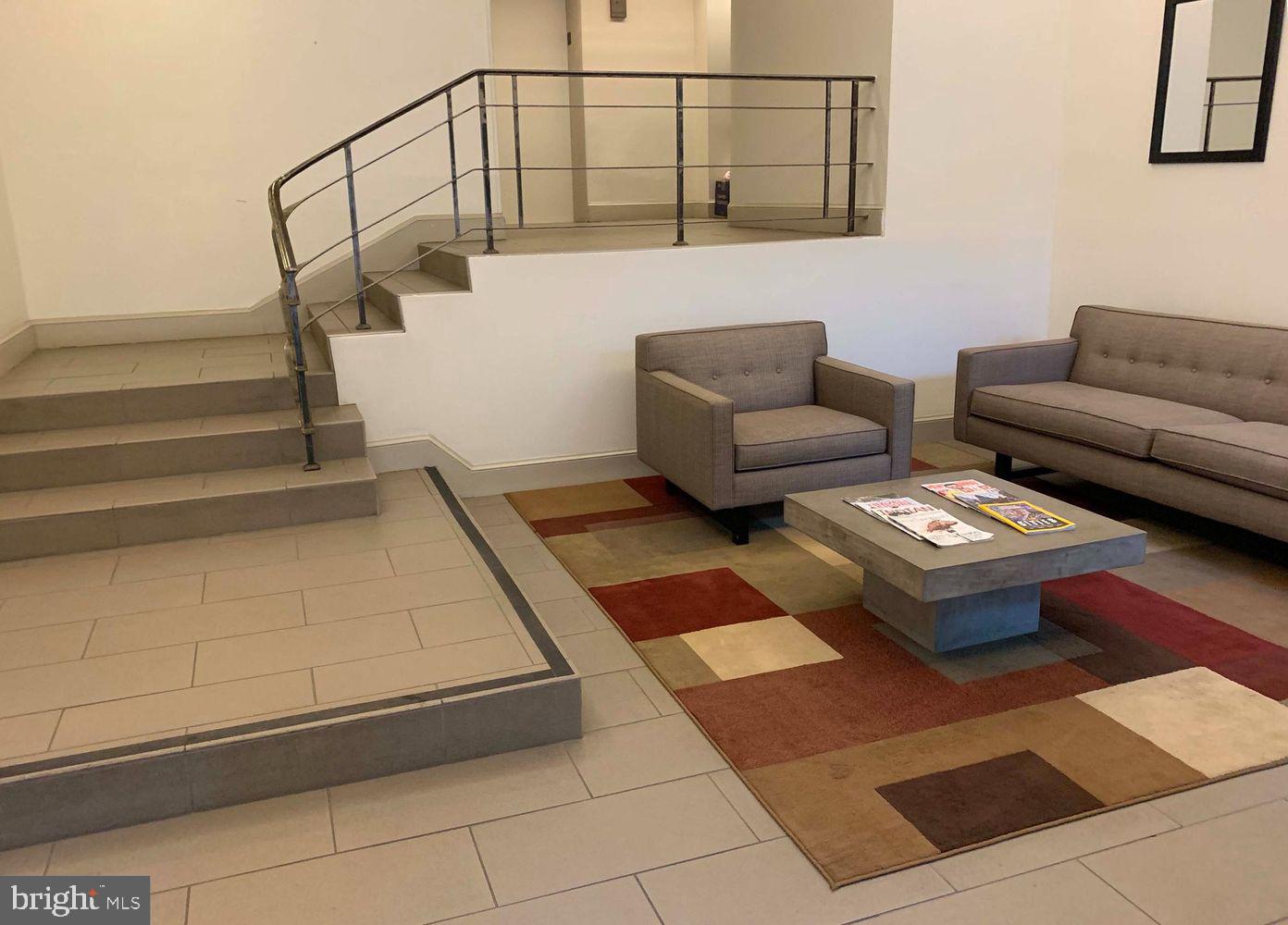 1825 T Street Northwest, Unit 303 Washington, DC 20009 - Photo 11 of 16 Bright, welcoming building lobby
