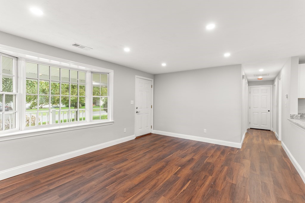 14 Fairbrook Road Framingham, MA 01701 - Photo 11 of 24 a view of wooden floor and windows in a room