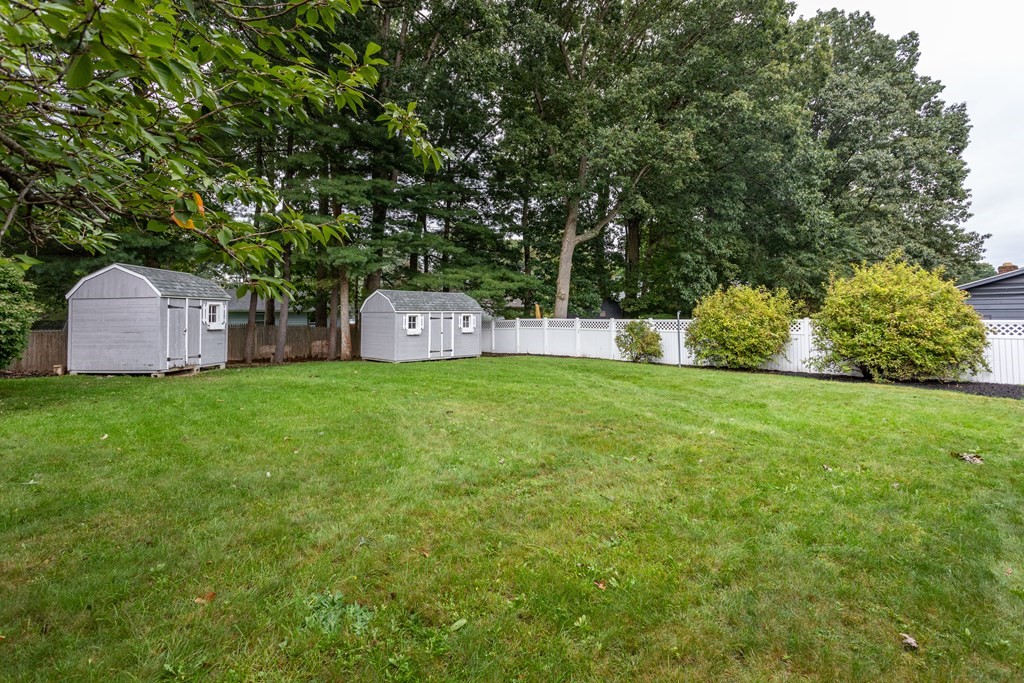 14 Fairbrook Road Framingham, MA 01701 - Photo 9 of 24 a view of a house with a yard and sitting area