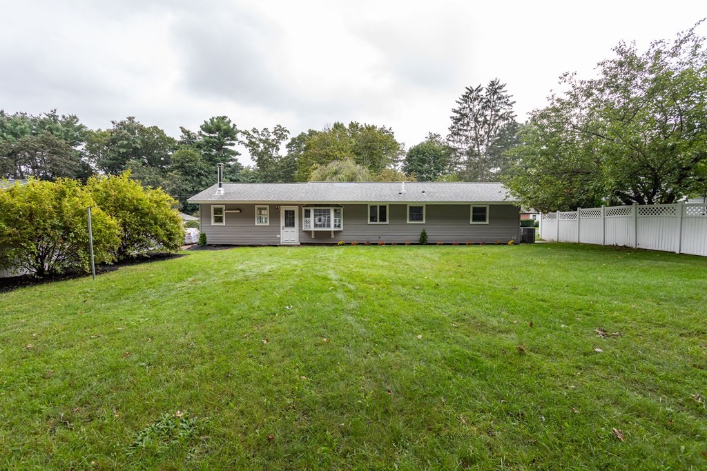 14 Fairbrook Road Framingham, MA 01701 - Photo 10 of 24 a view of a house with a big yard and large trees